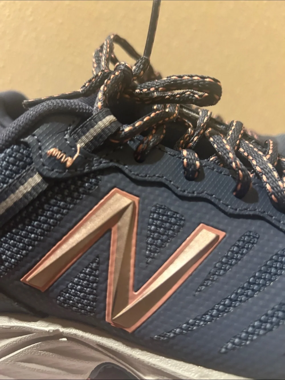 New Balance Women’s Navy with Rose Gold Accent Sneakers